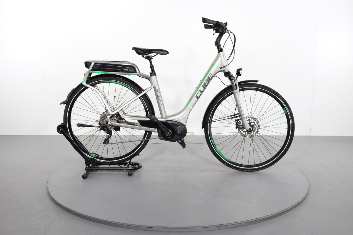 small boy driving bike